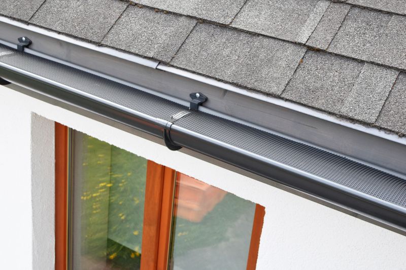 Gutter system with protective cover